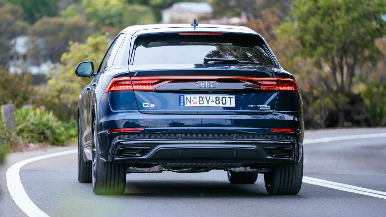 Audi Q8 60 TFSIe 2024 driving rear