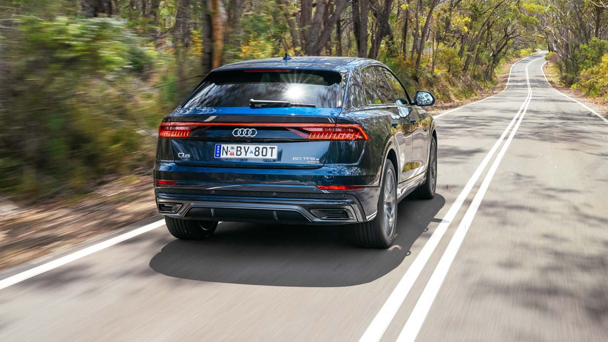 Audi Q8 60 TFSIe 2024 driving rear 2