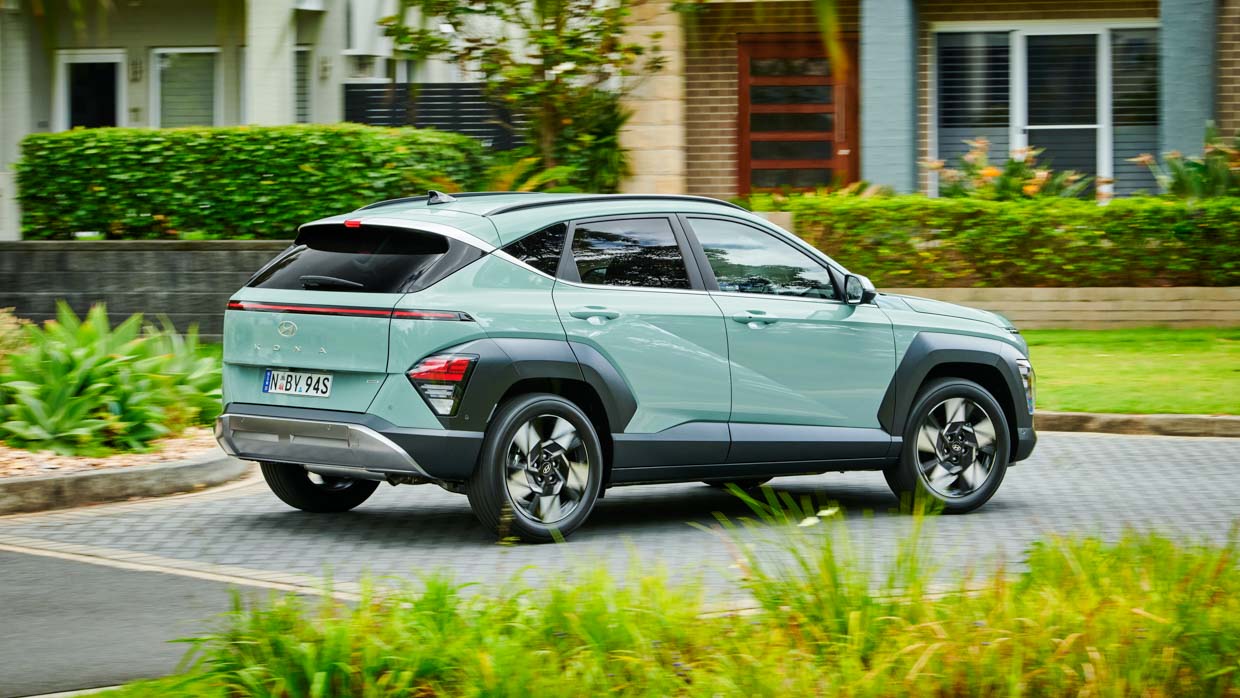 Hyundai Kona Hybrid Premium 2024 driving rear