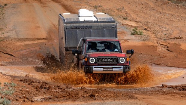 2024 Toyota Land Cruiser 70 Series towing caravan