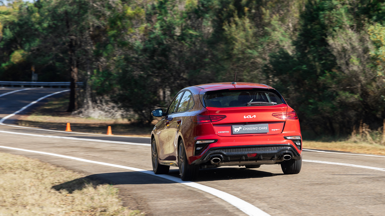 Kia Cerato GT 2024 driving rear 2