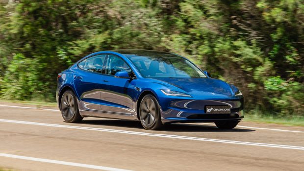 Tesla Model 3 RWD 2024 driving front 3/4 7