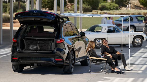 2024 Mazda CX-70 with aspect awning and folk sitting down