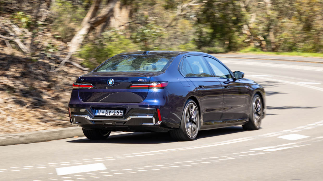 BMW i7 M70 2024 driving rear
