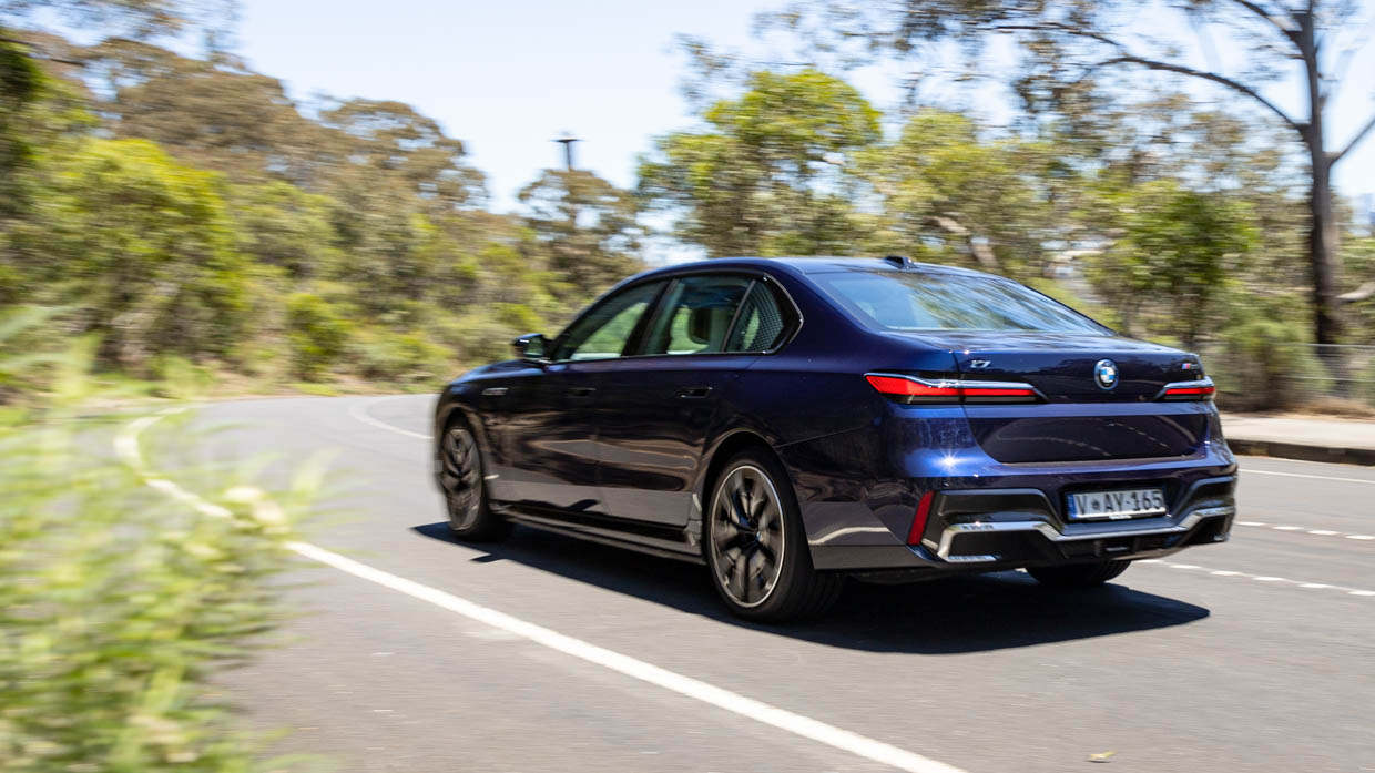 BMW i7 M70 2024 driving rear 2