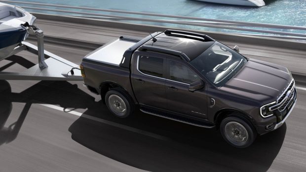 Ford Ranger Platinum towing boat side angle driving