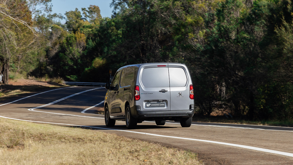 Peugeot E-Partner Pro 2024 driving rear 3