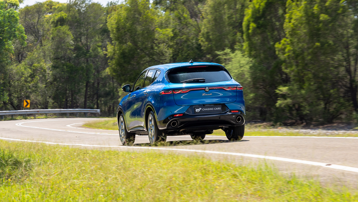Alfa Romeo Tonale Veloce PHEV 2024 driving rear