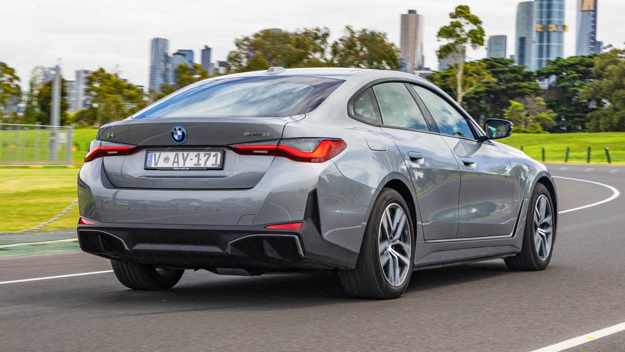 BMW i4 eDrive35 2024 driving rear 3/4 2