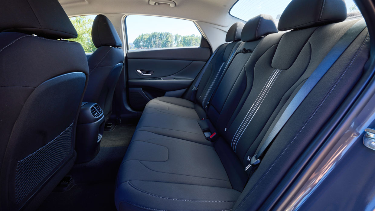 Hyundai i30 Sedan hybrid 2024 interior rear seats