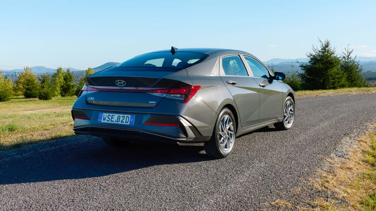 Hyundai i30 Sedan hybrid 2024 rear 3/4
