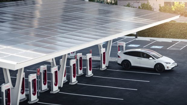 Tesla supercharger station with roof