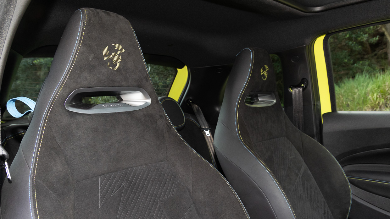 Abarth 500e 2024 interior front seats