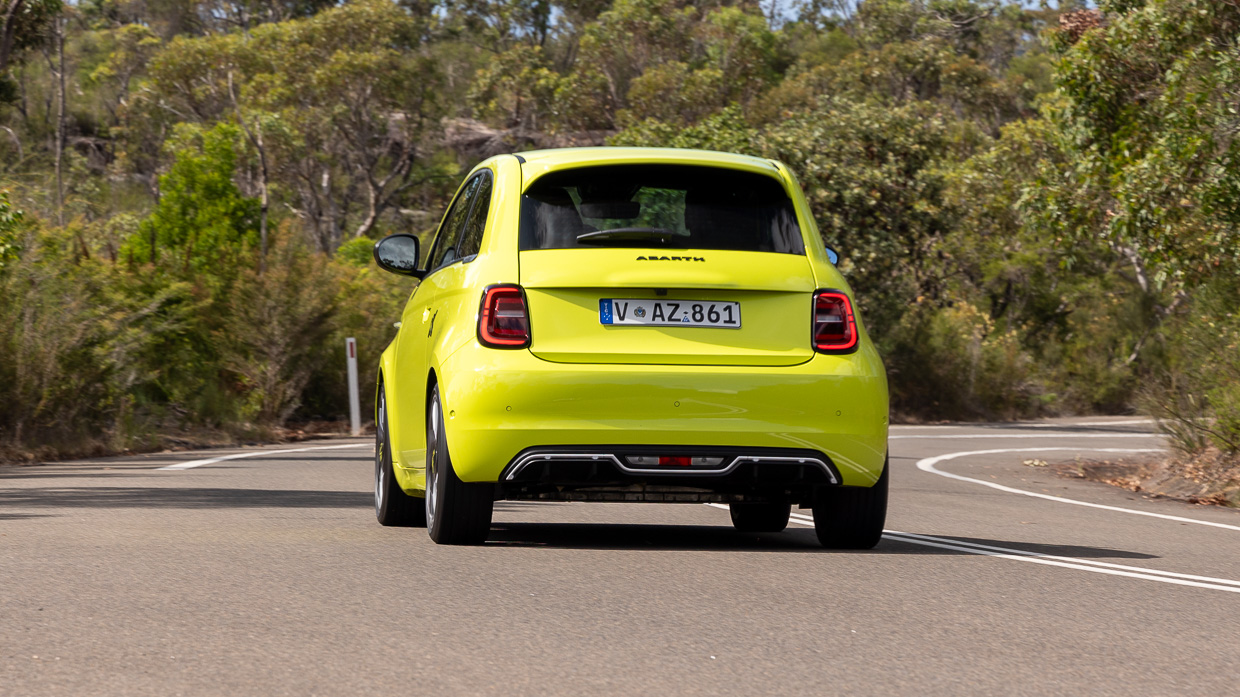 Abarth 500e 2024 driving rear 2