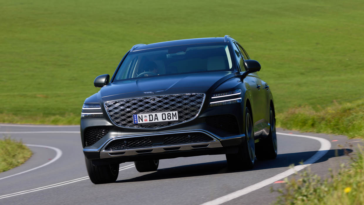 2025 Genesis GV80 front 3/4 driving shot