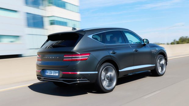 2025 Genesis GV80 rear 3/4 utilizing shot