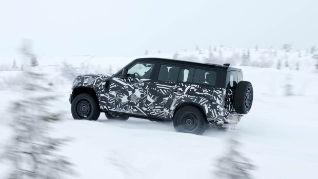 2024 Land Rover Defender OCTA prototype driving shot snow