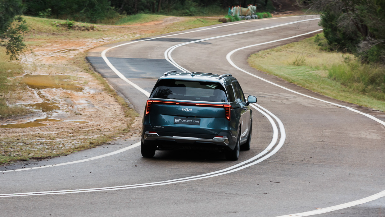 Kia Carnival GT-Line Lite 2024 driving rear 3