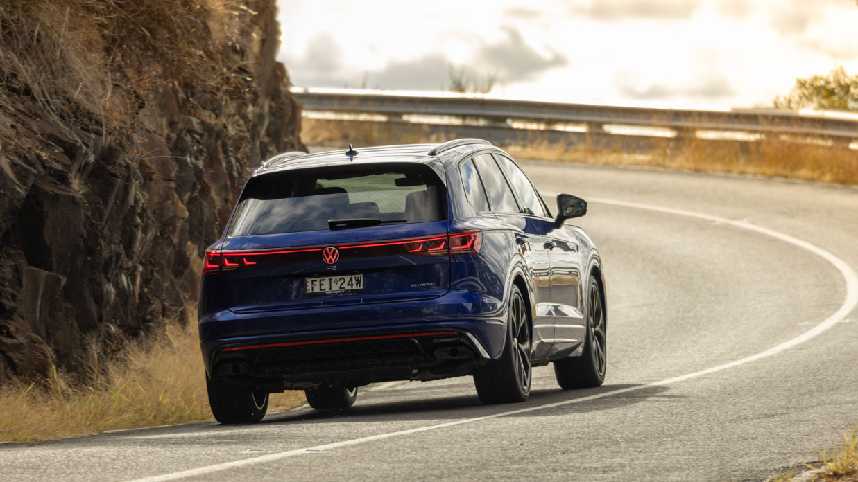 Volkswagen Touareg R 2024 driving rear rural