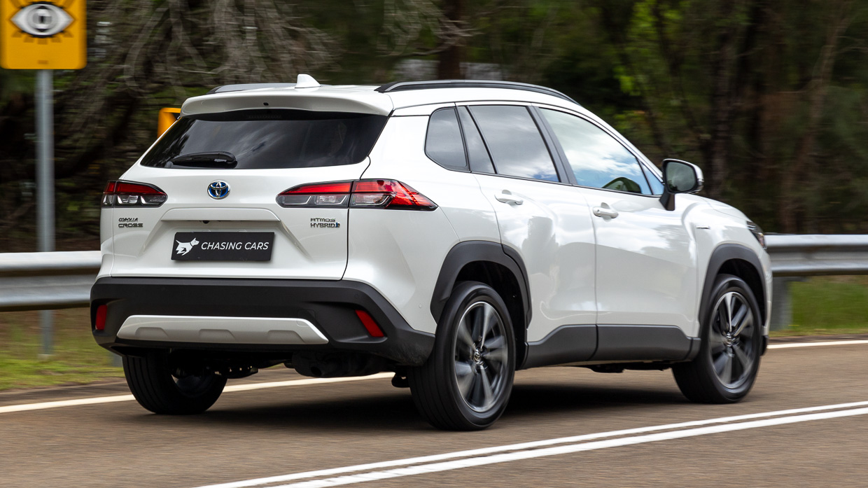 Toyota Corolla Cross Atmos 2024 driving rear 2
