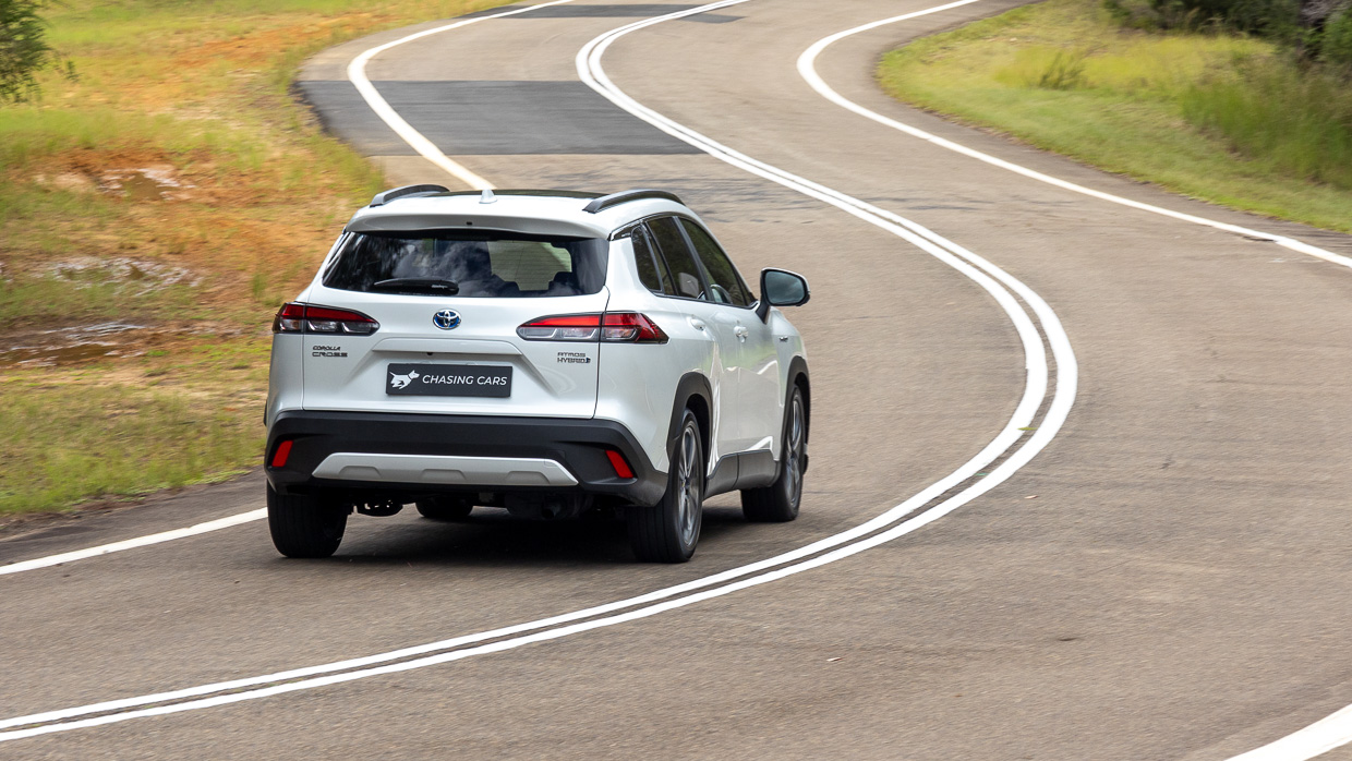 Toyota Corolla Cross Atmos 2024 driving rear 3