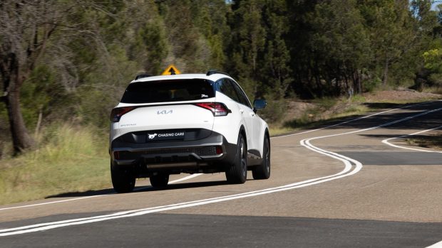 2024 Kia Sportage GT-Line Hybrid long-term driving shot rear 3/4 passing shot