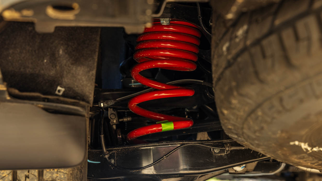 2024 Nissan Patrol Warrior red coil springs close up