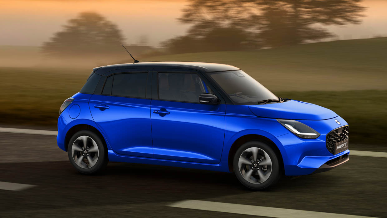 2024 Suzuki Swift blue side angle driving shot