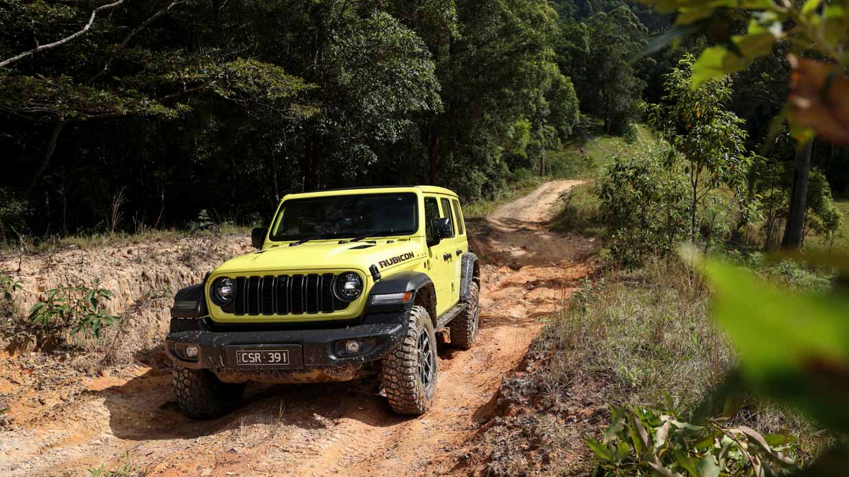 Jeep Wrangler Rubicon 2024 driving front 2