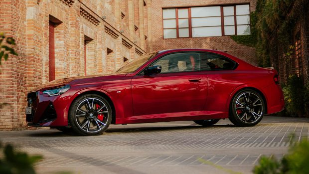 2025 BMW M240i xDrive crimson facet perspective static shot