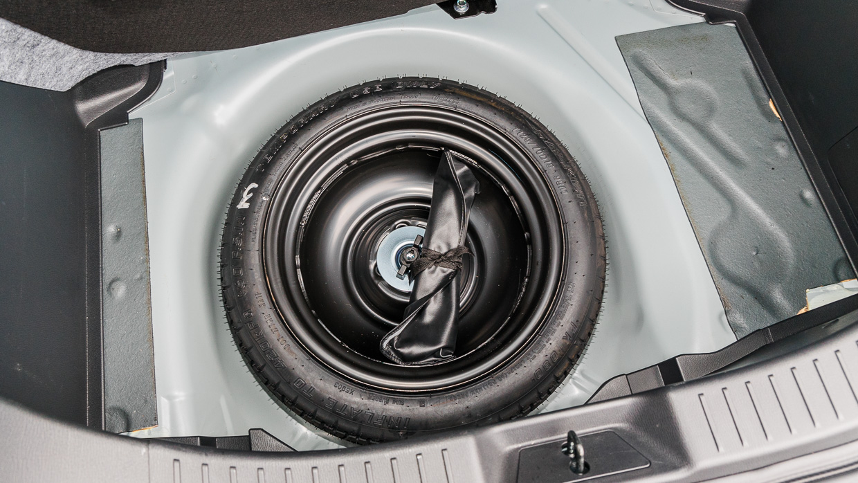 Mazda 2 GT 2024 interior spare wheel