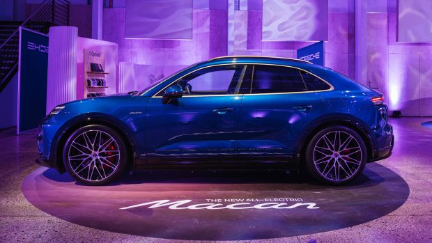 2024 Porsche Macan EV side angle at reveal night