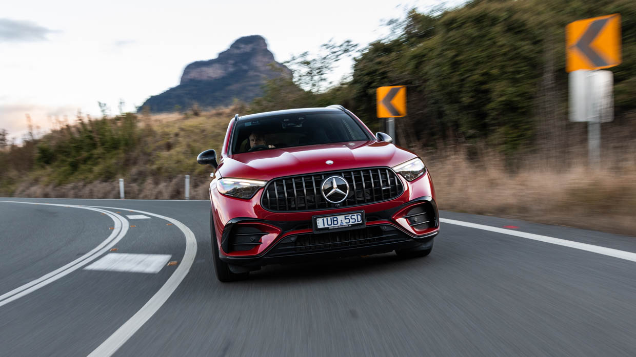 2024 Mercedes-AMG GLC 63 S front 3/4 tracking shot 3