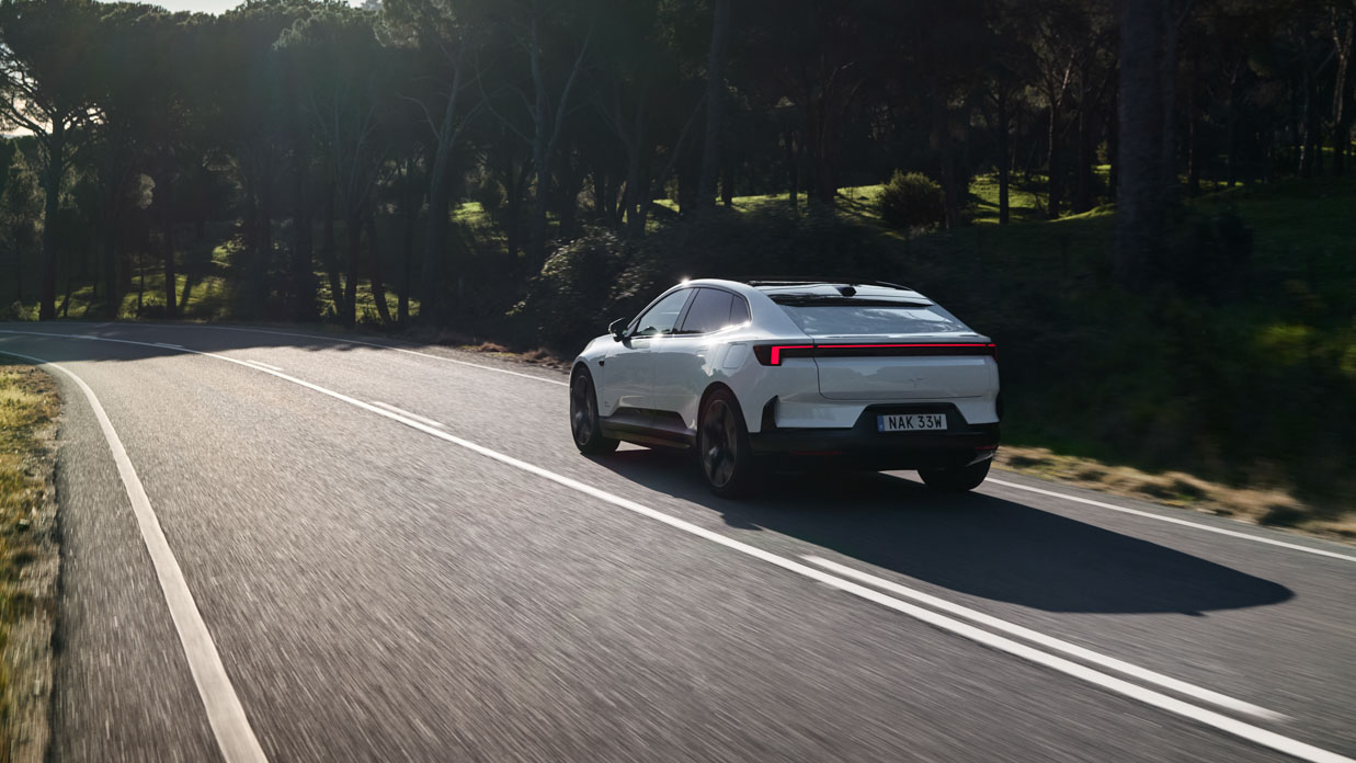 Polestar 4 2024 driving rear 2