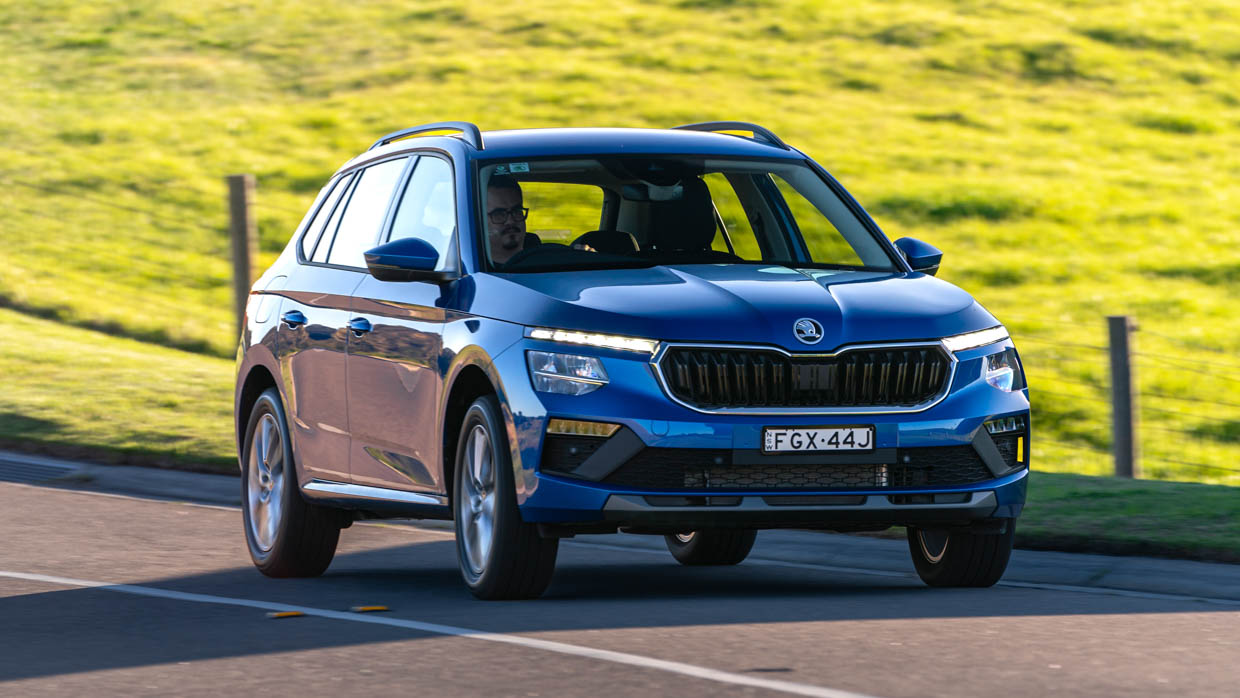 2024 Skoda Kamiq Select front angle driving shot with grass