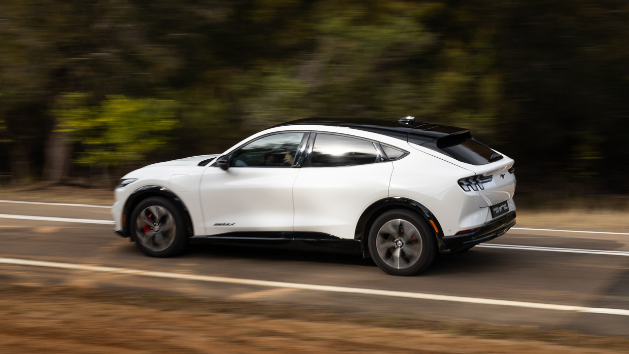 Ford Mustang Mach-E Premium 2024 driving rear 2
