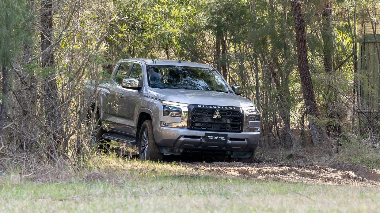 2024 Mitsubishi Triton GLS driving through sand