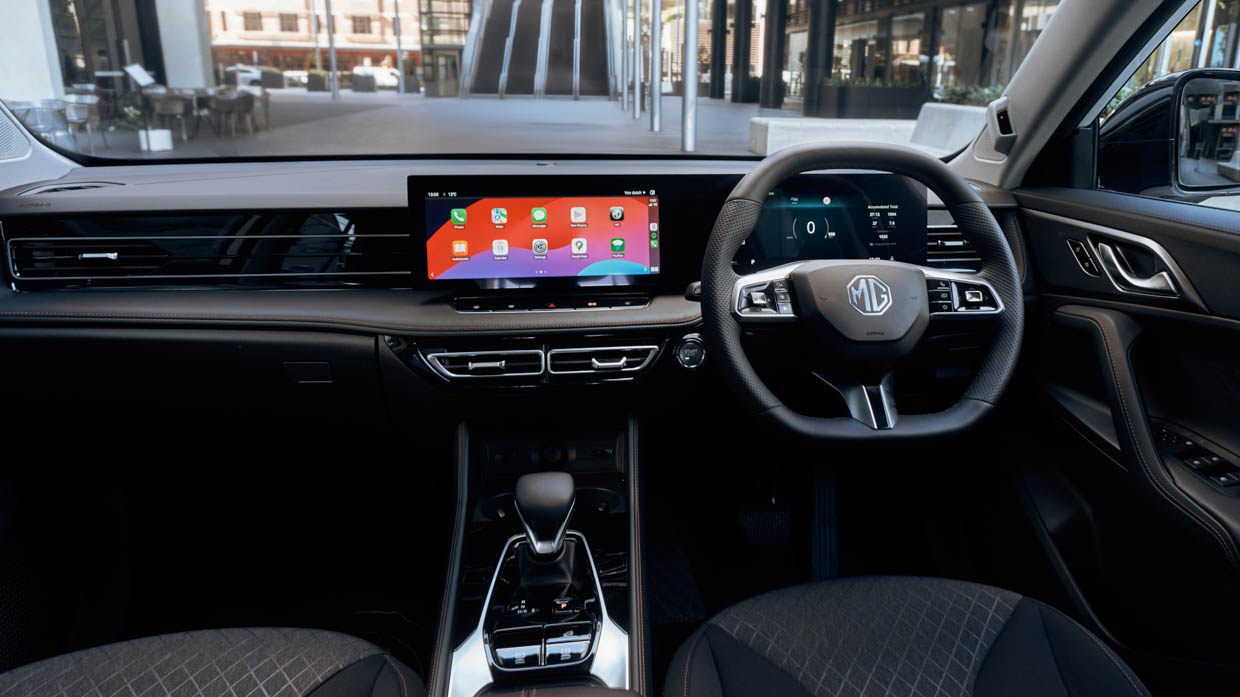 2024 MG HS interior wide shot with wheel and screens
