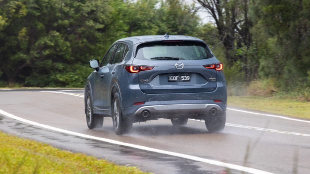 Mazda CX-5 Akera 2024 driving rear