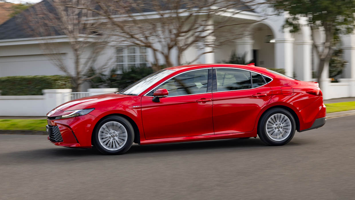 2024 Toyota Camry Ascent side angle driving shot 2