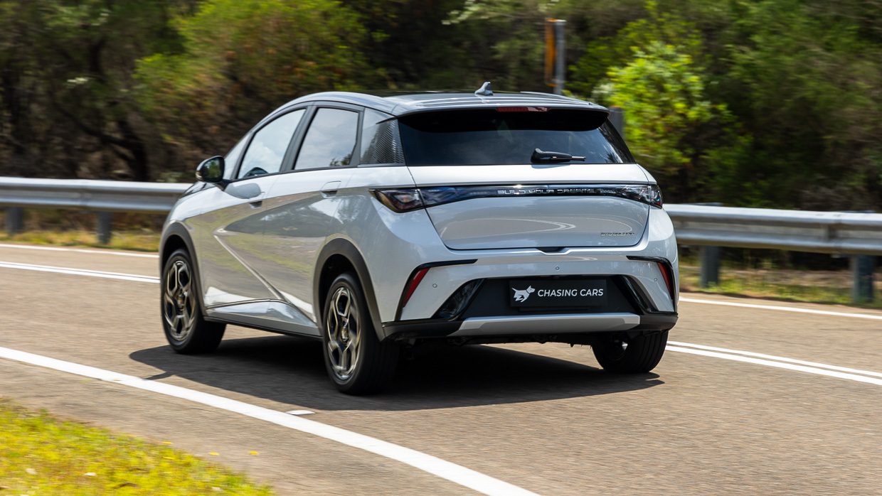 2024 BYD Dolphin Premium rear angle driving shot 2