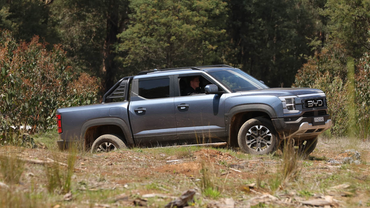 2025 BYD Shark 6 blue side angle off-road