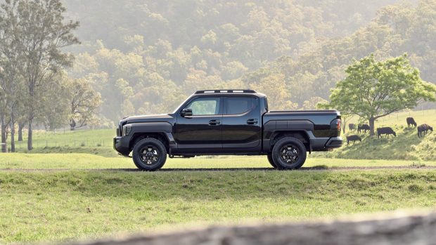 2025 Kia Tasman side attitude wide shot