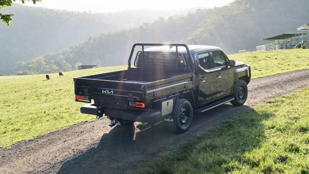 2025 Kia Tasman rear 3/4 attitude alloy tray shot