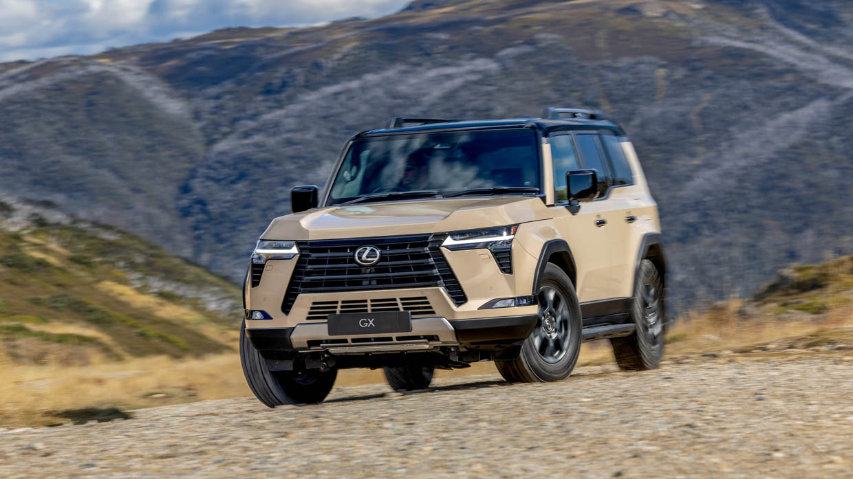 2024 Lexus GX Overtrail front 3/4 on dirt turning