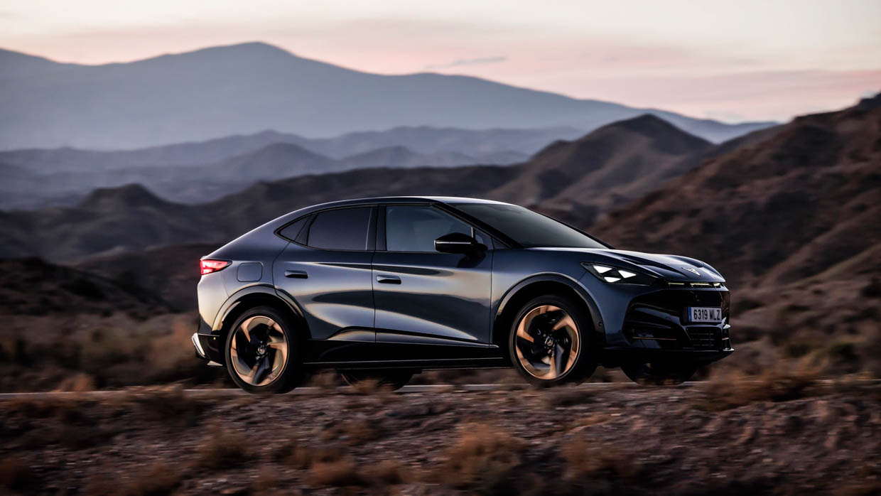 2025 Cupra Tavascan side profile driving shot