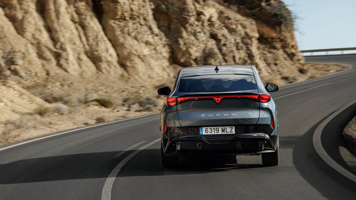 2025 Cupra Tavascan rear angle mountains 2