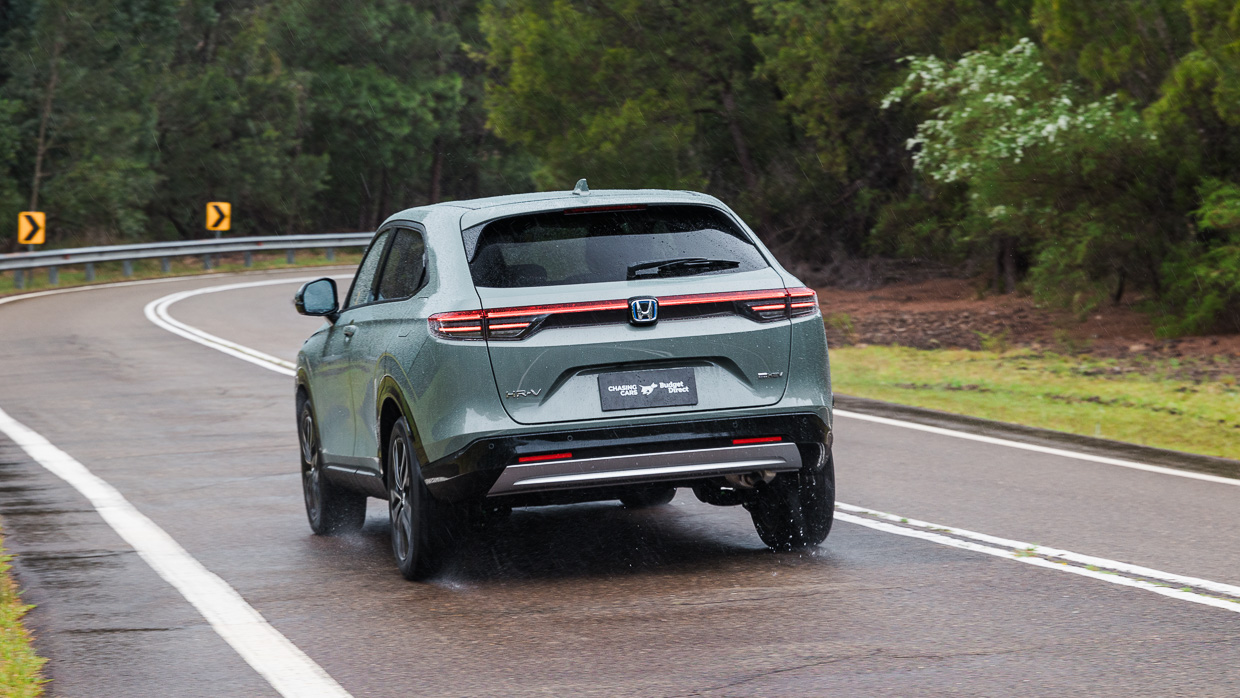 2024 Honda HR-V E:HEV L rear angle driving shot