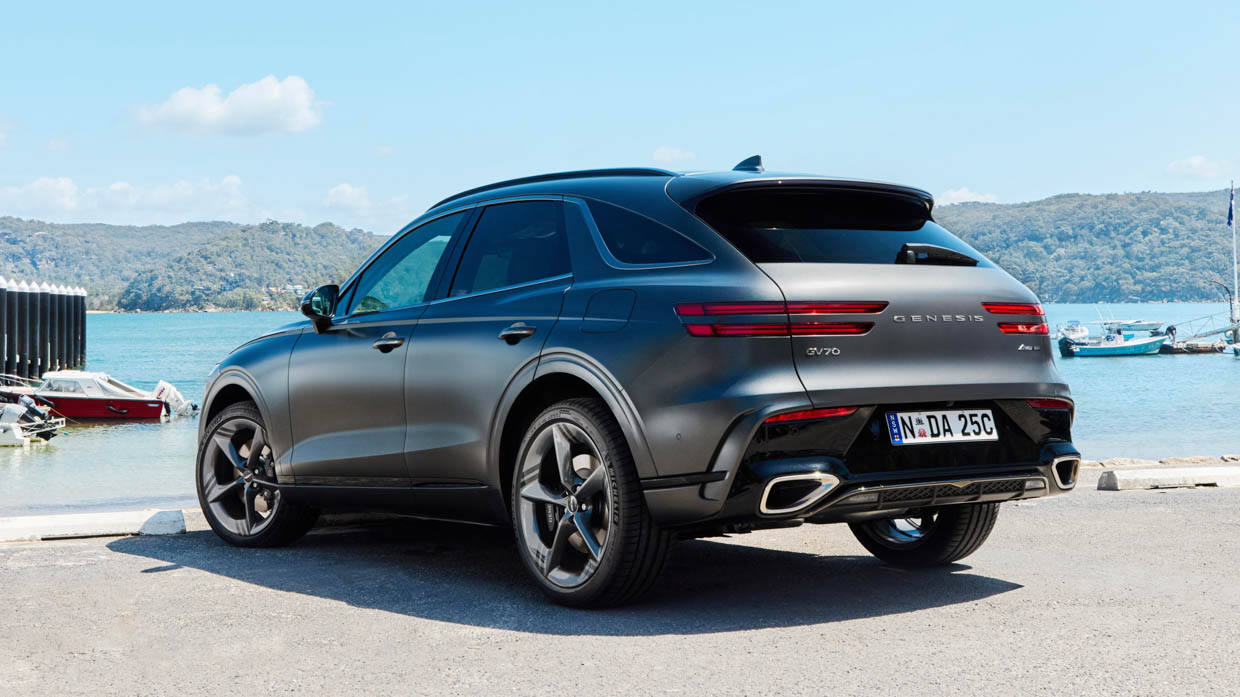 2025 Genesis GV70 Signature Sport rear 3/4 static by the water