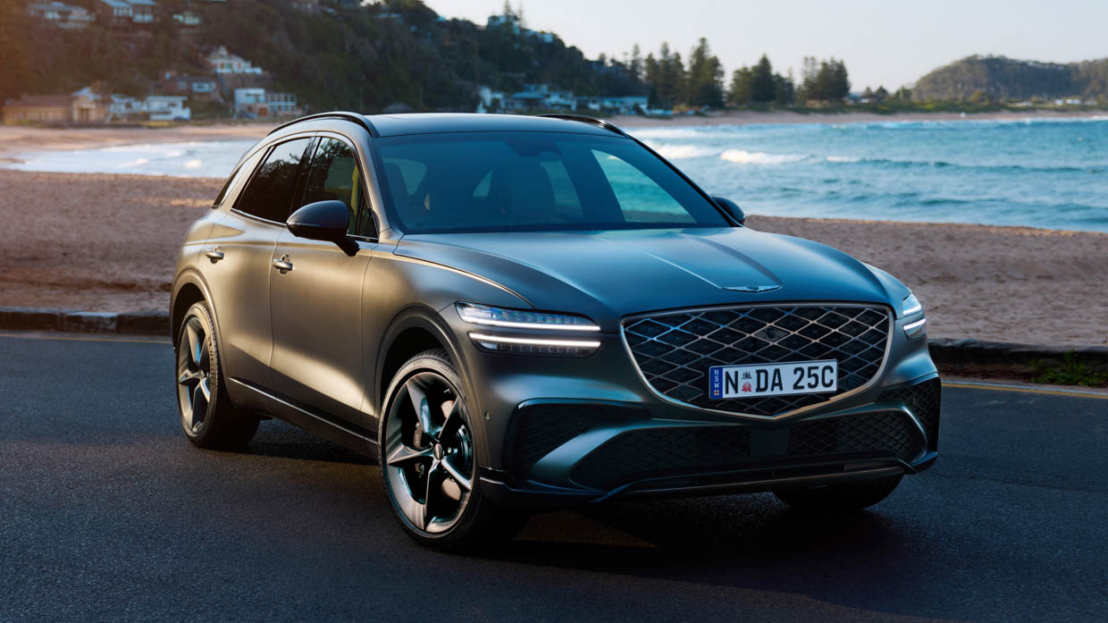 2025 Genesis GV70 Signature Sport front angle beach shot